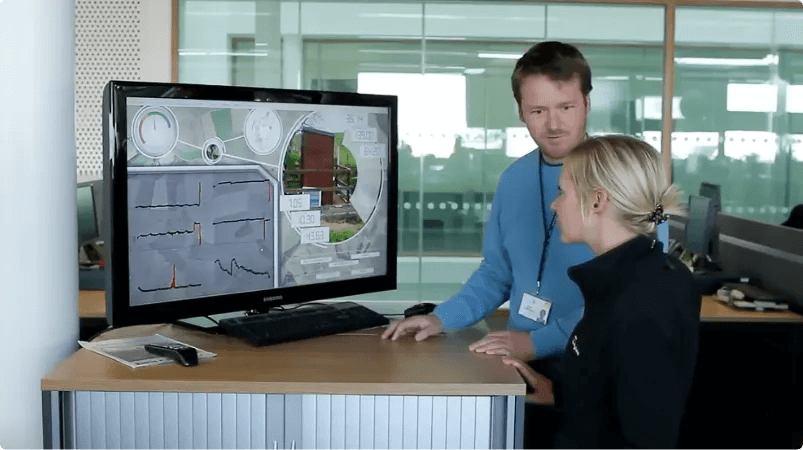 2 people using computer photo